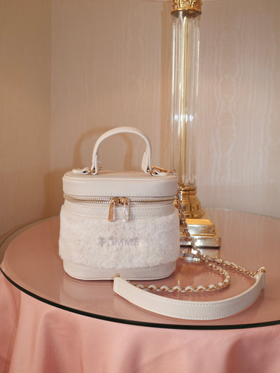 POMME embroidery fur vanity bag